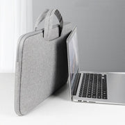 The XB08 Portable Bag for Laptop is the perfect solution for keeping your laptop safe and protected while on the go. Its lightweight and durable design makes it easy to transport, while its padded interior provides added protection against bumps and drops. Stay worry-free and stylish with the XB08 Portable Bag for Laptop.