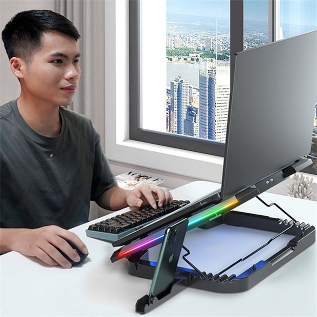 Transform your notebook into a powerful cooling machine with the XC03 RGB Notebook Cooler Stand! With its sleek design and customizable RGB lighting, this stand provides optimal airflow and reduces heat buildup. Keep your laptop cool and perform at its best with this must-have accessory.